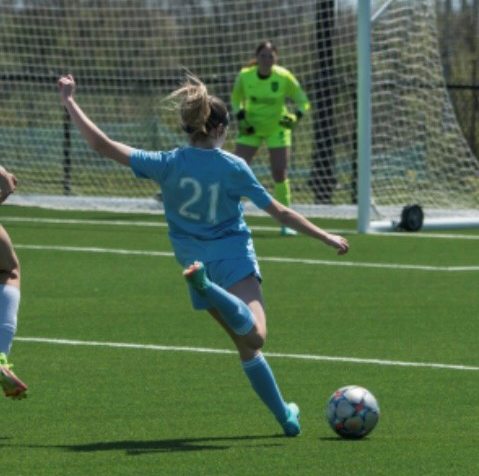 player kickiing ball